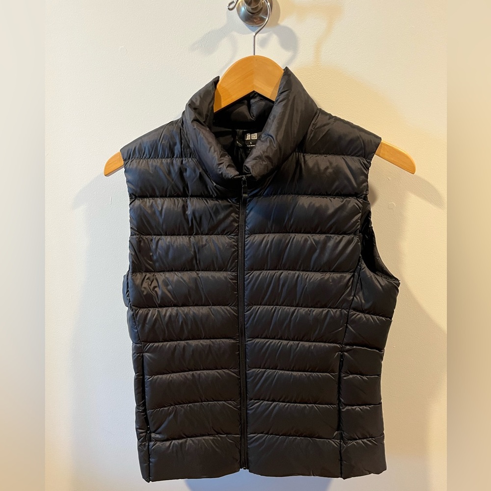 Uniqlo woman’s puffer vest. Ultralight down. Never worn. Without tags. Black.